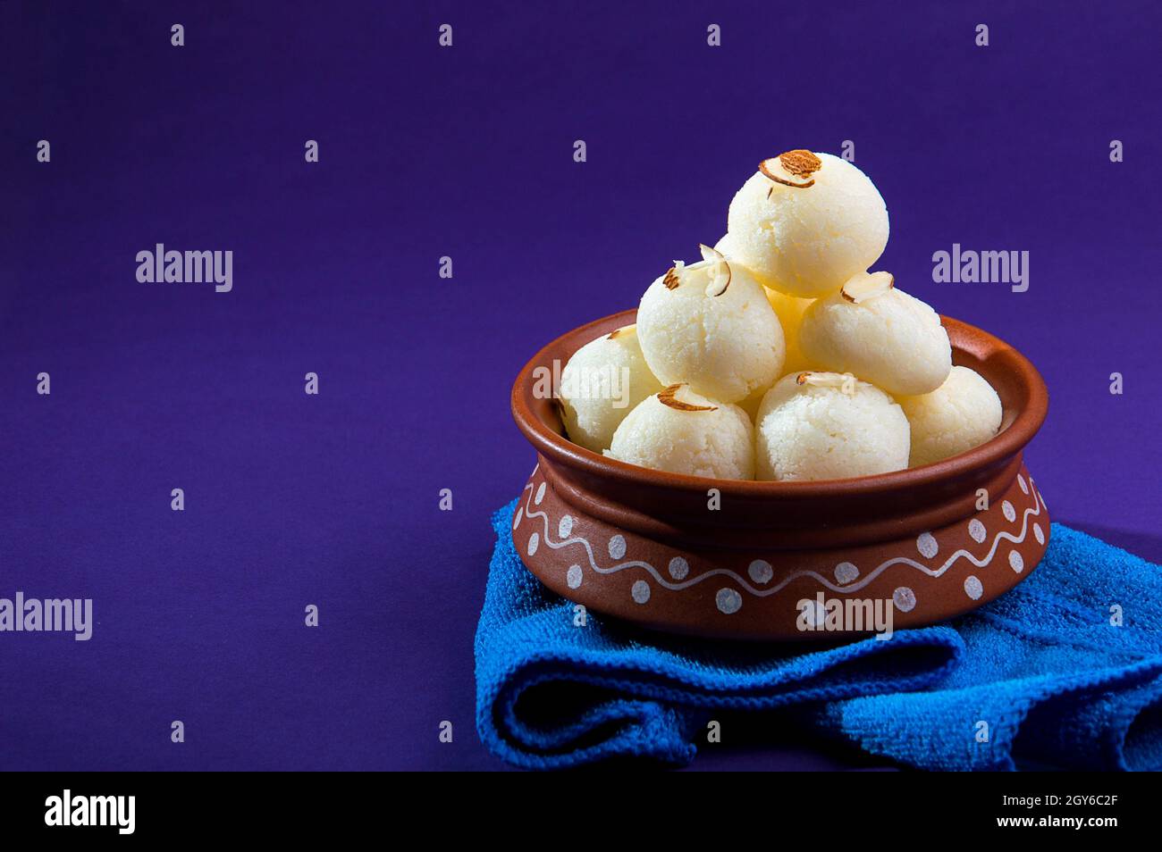 Indian Sweet or Dessert - Rasgulla, Famous Bengali sweet in clay bowl ...