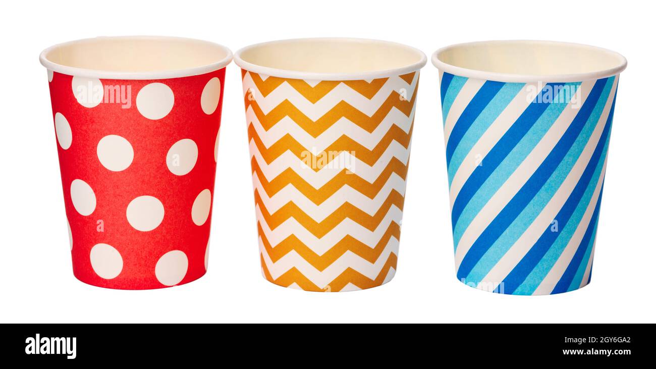 Paper disposable cups with colored pattern isolated on white background Stock Photo