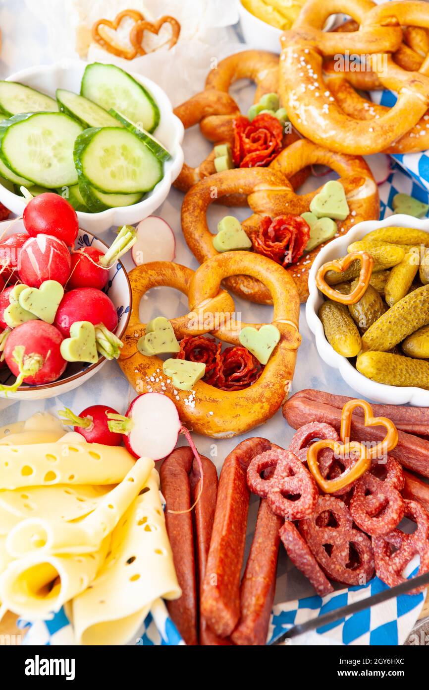 Bavarian meat and cheese platter with pretzels Stock Photo