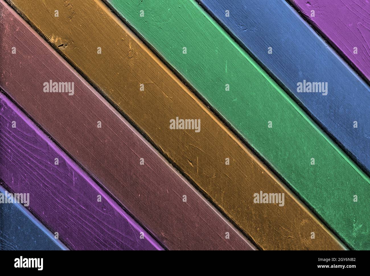 Rainbow colored wooden plank background. Texture with copy space Stock