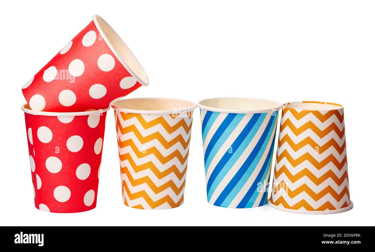 Paper disposable cups with colored pattern isolated on white background Stock Photo