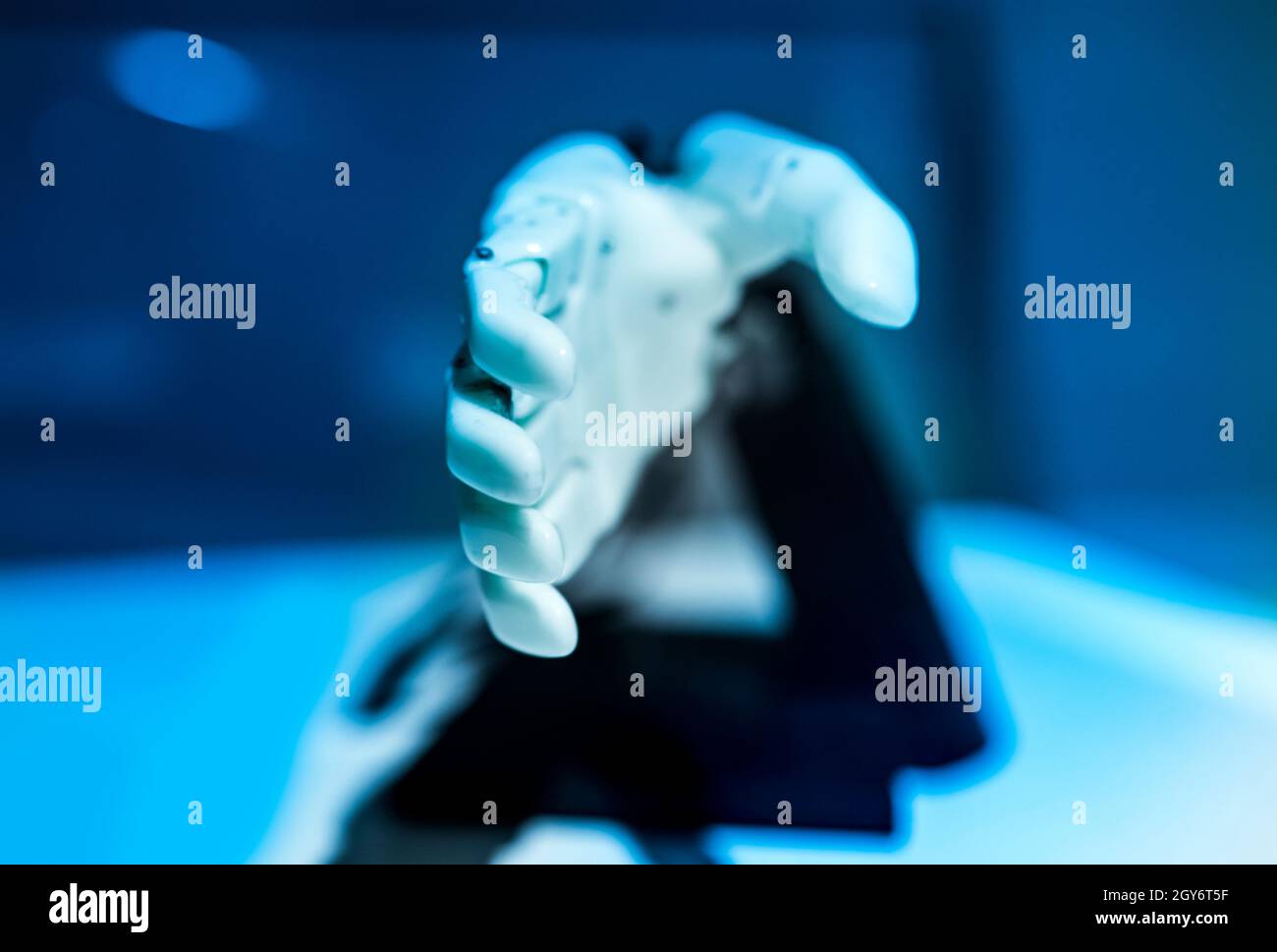 plastic robot hand with open palm gesture Stock Photo