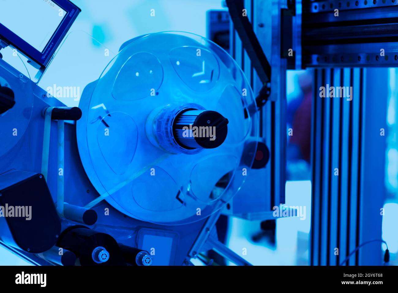 Sticker label printer. Barcode digital printer and applicator machine Stock Photo Alamy