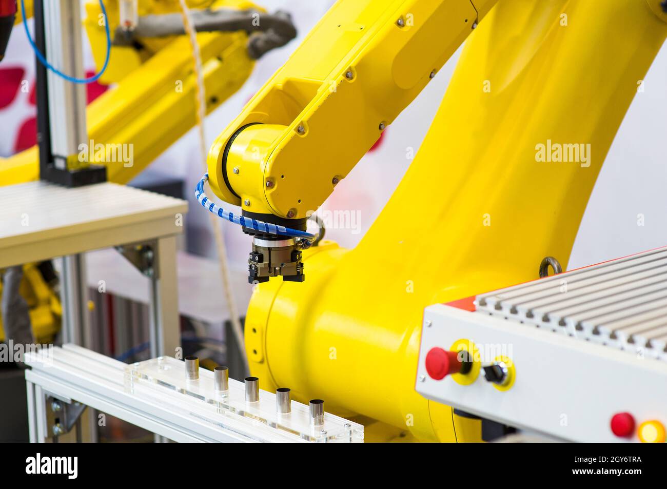 Augmented reality for industry concept. Robotic and Automation system control application on automate robot arm in smart manufacturing background Stock Photo