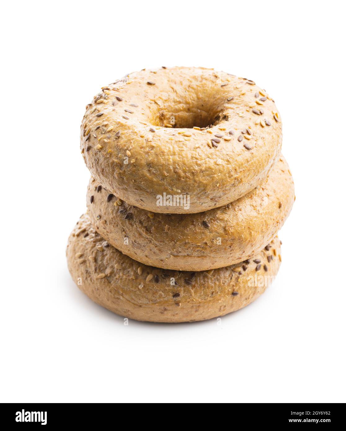Whole grain baked bagel isolated on white background. Stock Photo