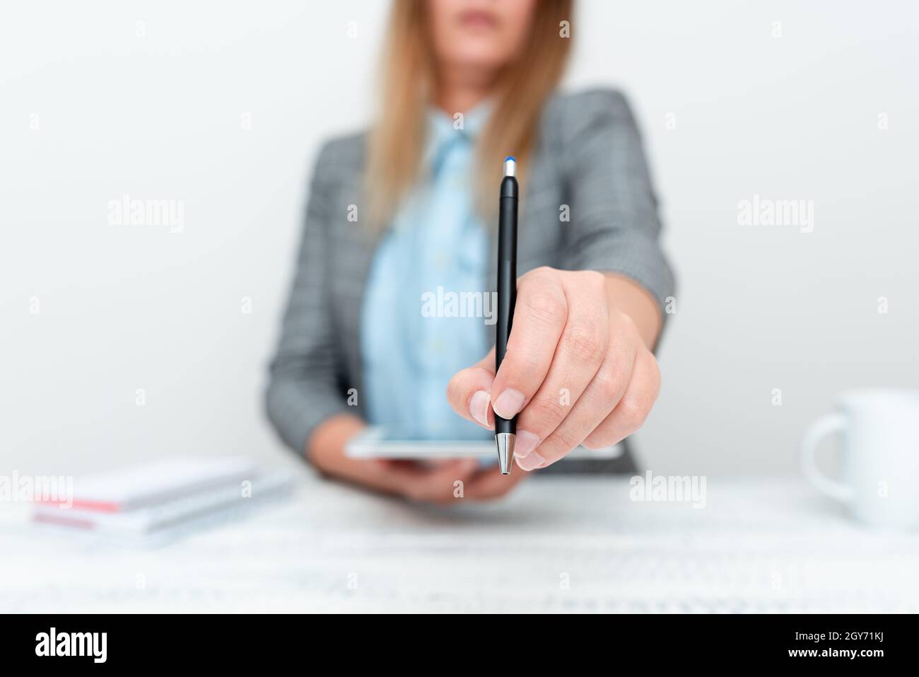 Displaying New Smartphone Technology, Discussing Device Improvements Stock Photo