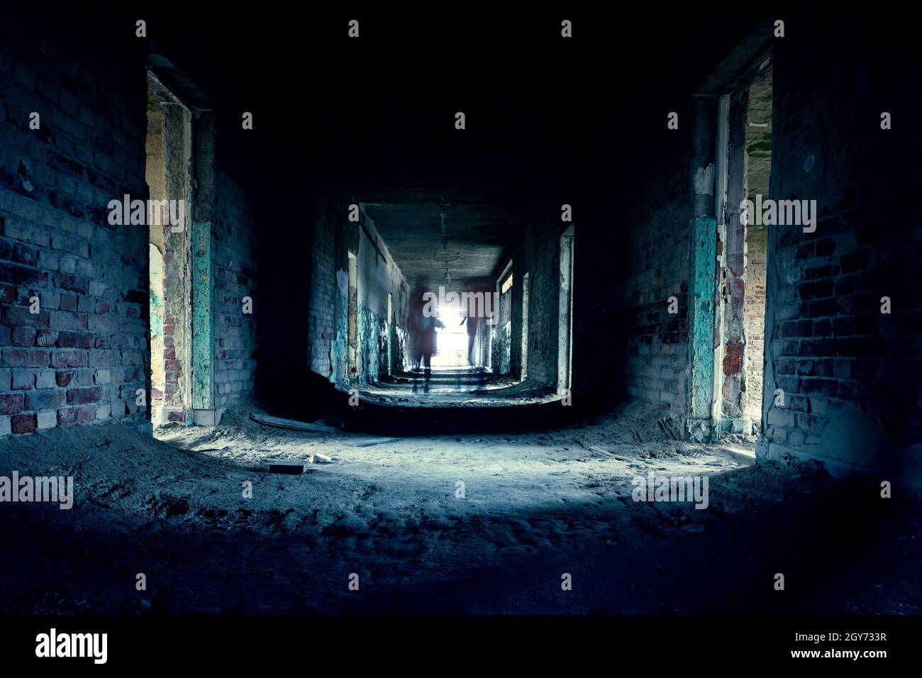 abandoned creepy corridor with ghoast in szentkiralyszabadja Hungary ghost tour . Stock Photo