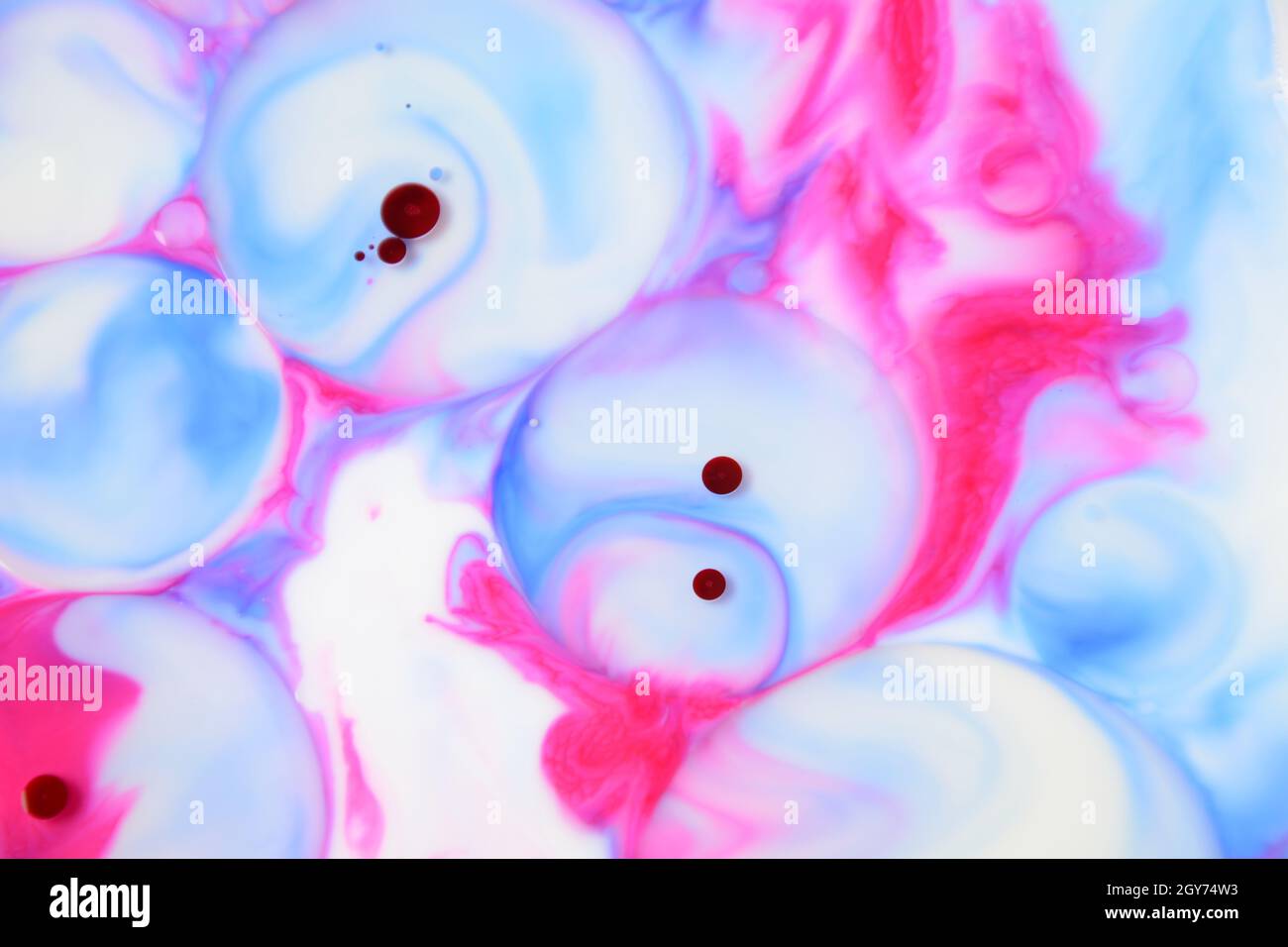 Abstract colors, backgrounds and textures. Food Coloring in milk. Food