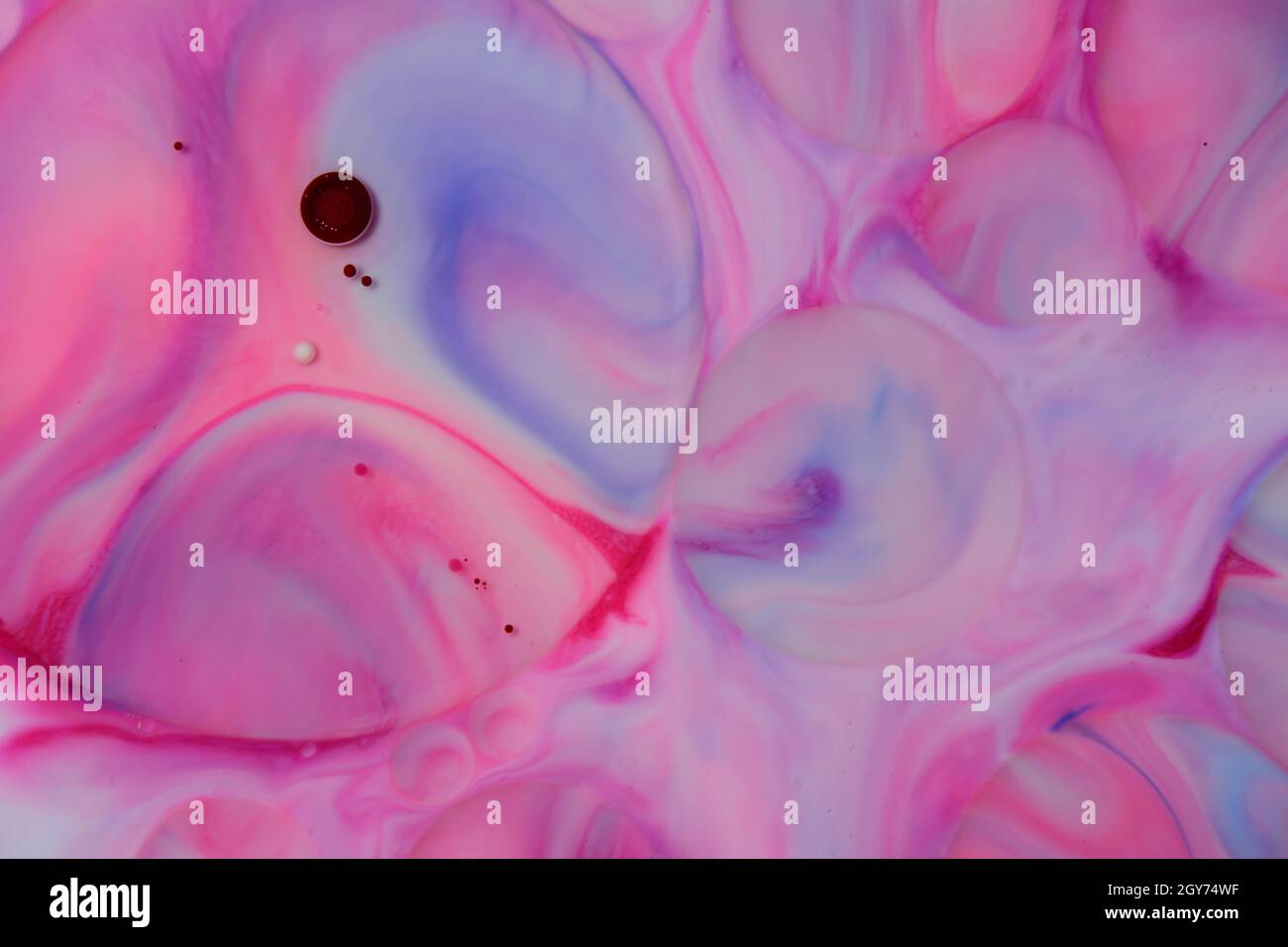 Abstract colors, backgrounds and textures. Food Coloring in milk. Food