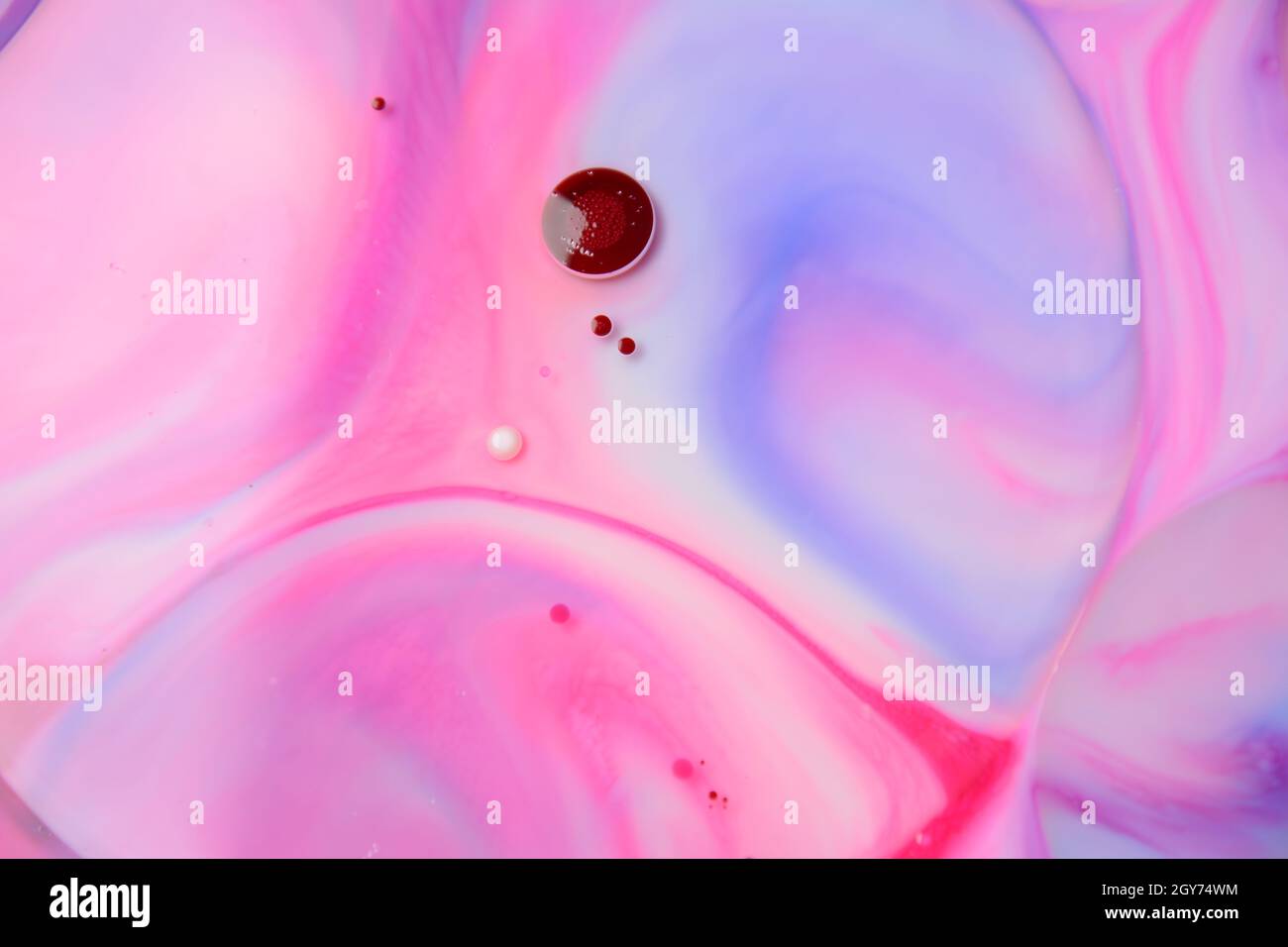 Abstract colors, backgrounds and textures. Food Coloring in milk. Food