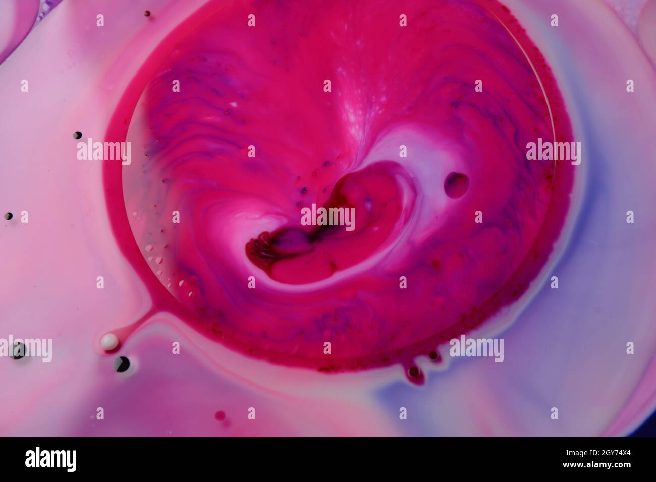 Abstract colors, backgrounds and textures. Food Coloring in milk. Food