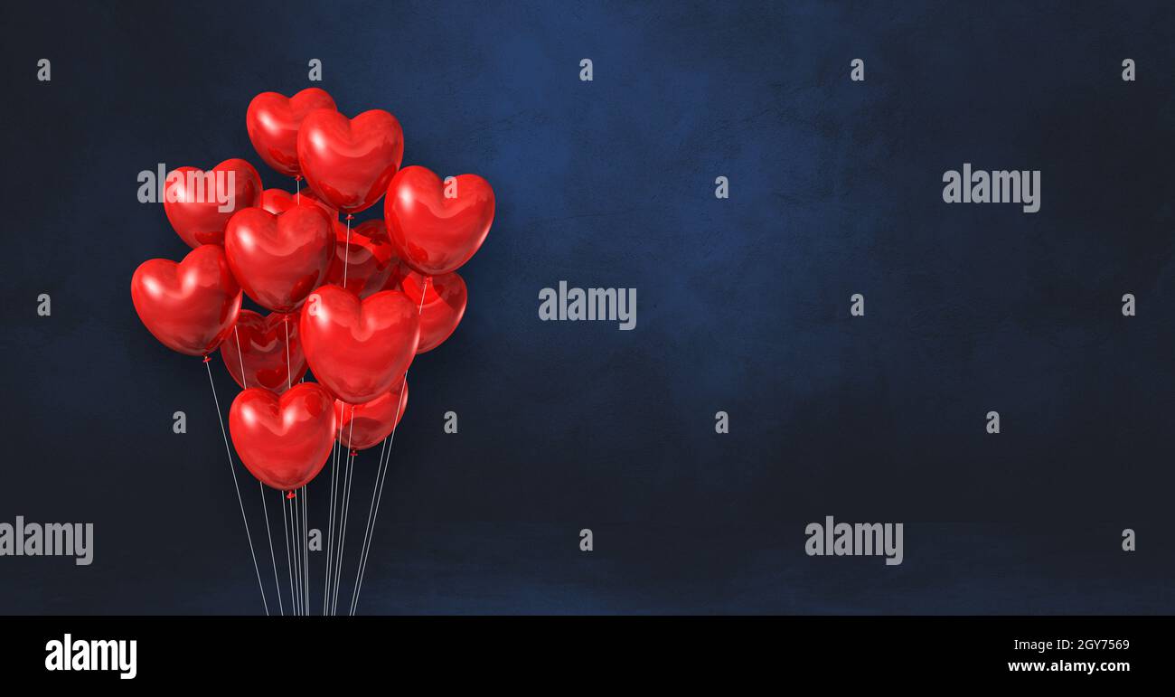 Red heart shape balloons bunch on a black wall background. Horizontal ...
