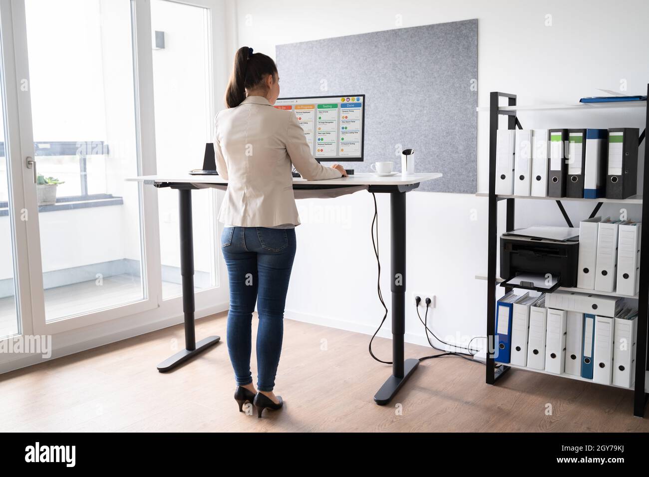 Adjustable Height Office Desk. Working While Standing Stock Photo Alamy
