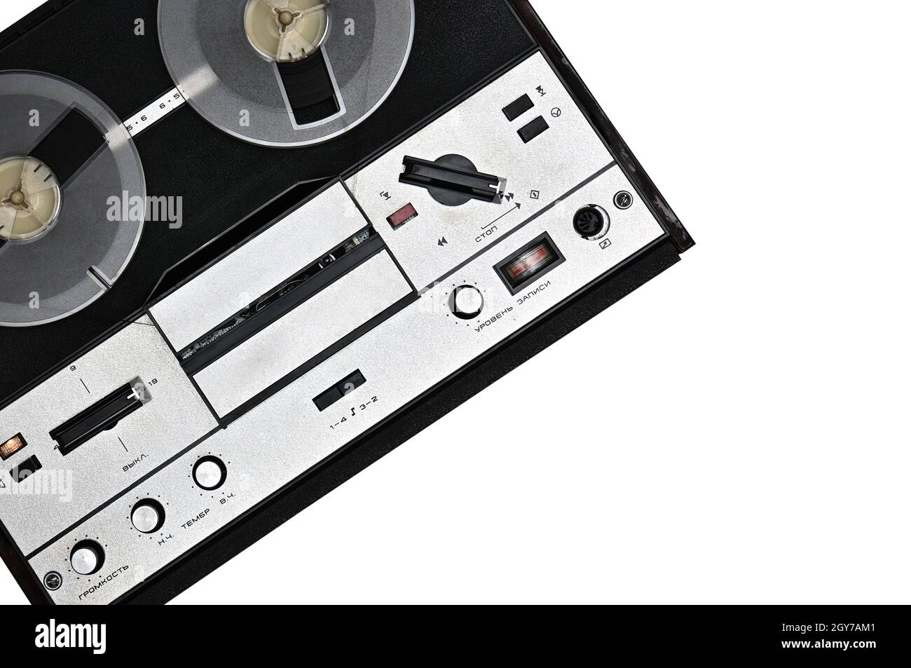 Vintage reel to reel tape recorder on isolated white background