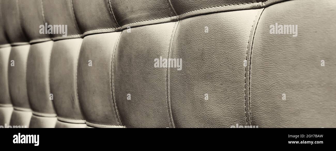 Tufted grey leather headboard texture, used for background Stock Photo