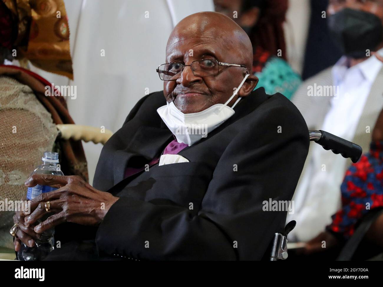 Cape Town's Archbishop Emeritus Desmond Tutu reacts during a Eucharist  church service to celebrate his 90th