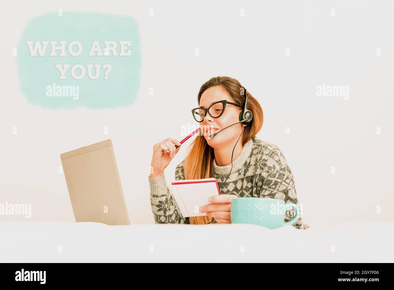 Handwriting text Who Are You Question, Word for asking an individual identity or an individualal information Callcenter Agent Working From Home, Stude Stock Photo