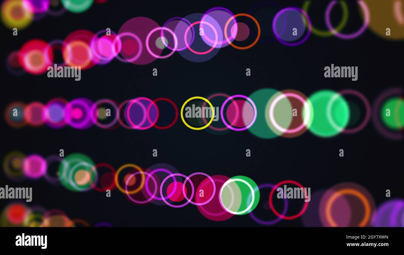 Computer generated the rows of multi colored circles and rings. 3d rendering abstract background from different round particles Stock Photo