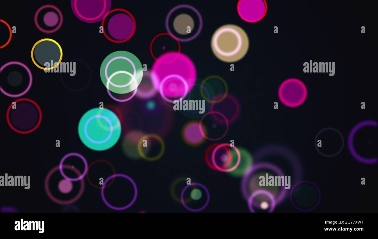 Computer generated the rows of multi colored circles and rings. 3d rendering abstract background from different round particles Stock Photo