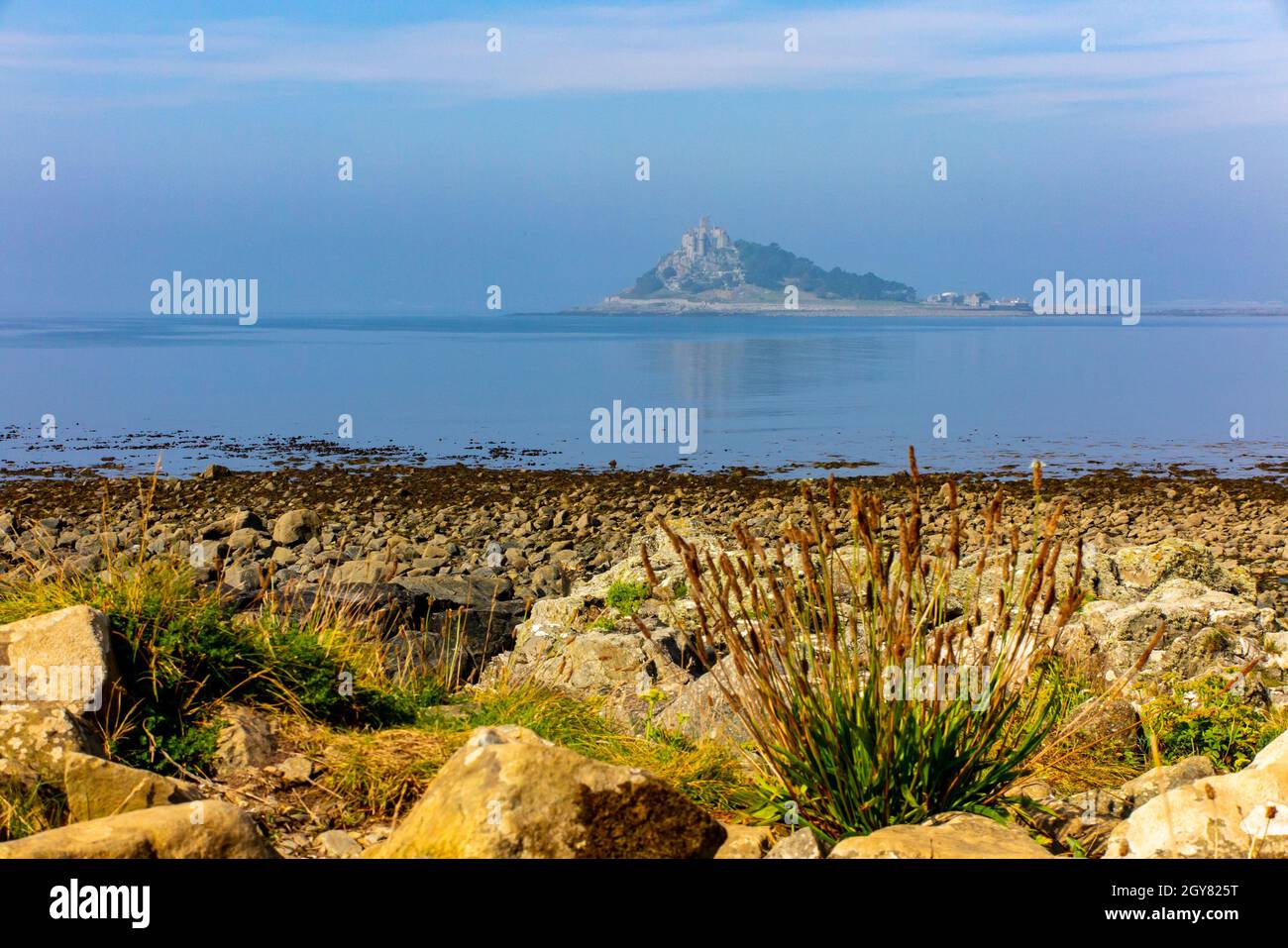 St Michael's Mount seen from the South West Coast Path near Perranuthnoe on the southern coast of Cornwall England UK Stock Photo