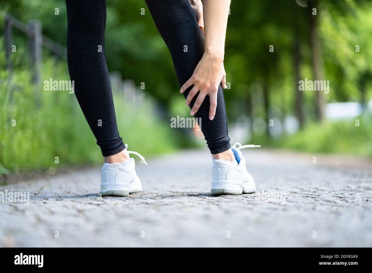 Calf Injury And Cramp Pain. Sport Athlete Jogging Stock Photo Alamy