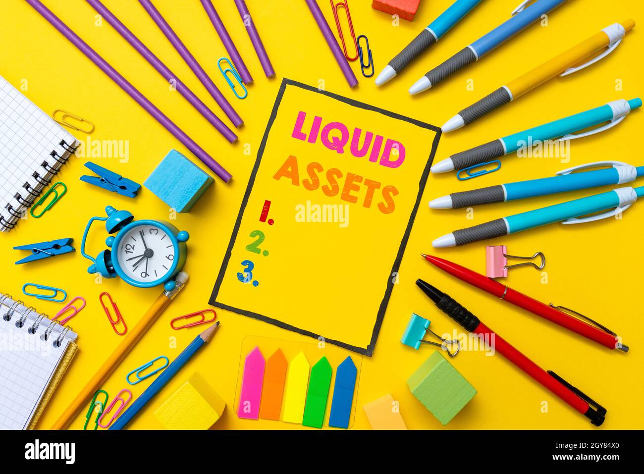 Writing displaying text Liquid Assets, Word for Cash and Bank Balances Market Liquidity Deferred Stock Flashy School And Office Supplies Bright Teachi Stock Photo