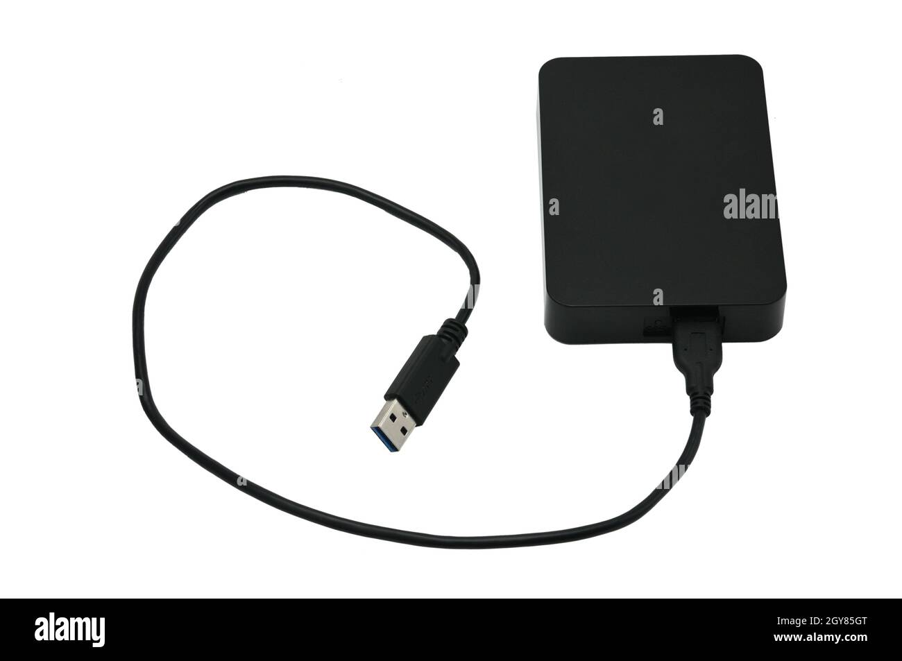 Portable hard drive for backing up various files on an isolated white ...