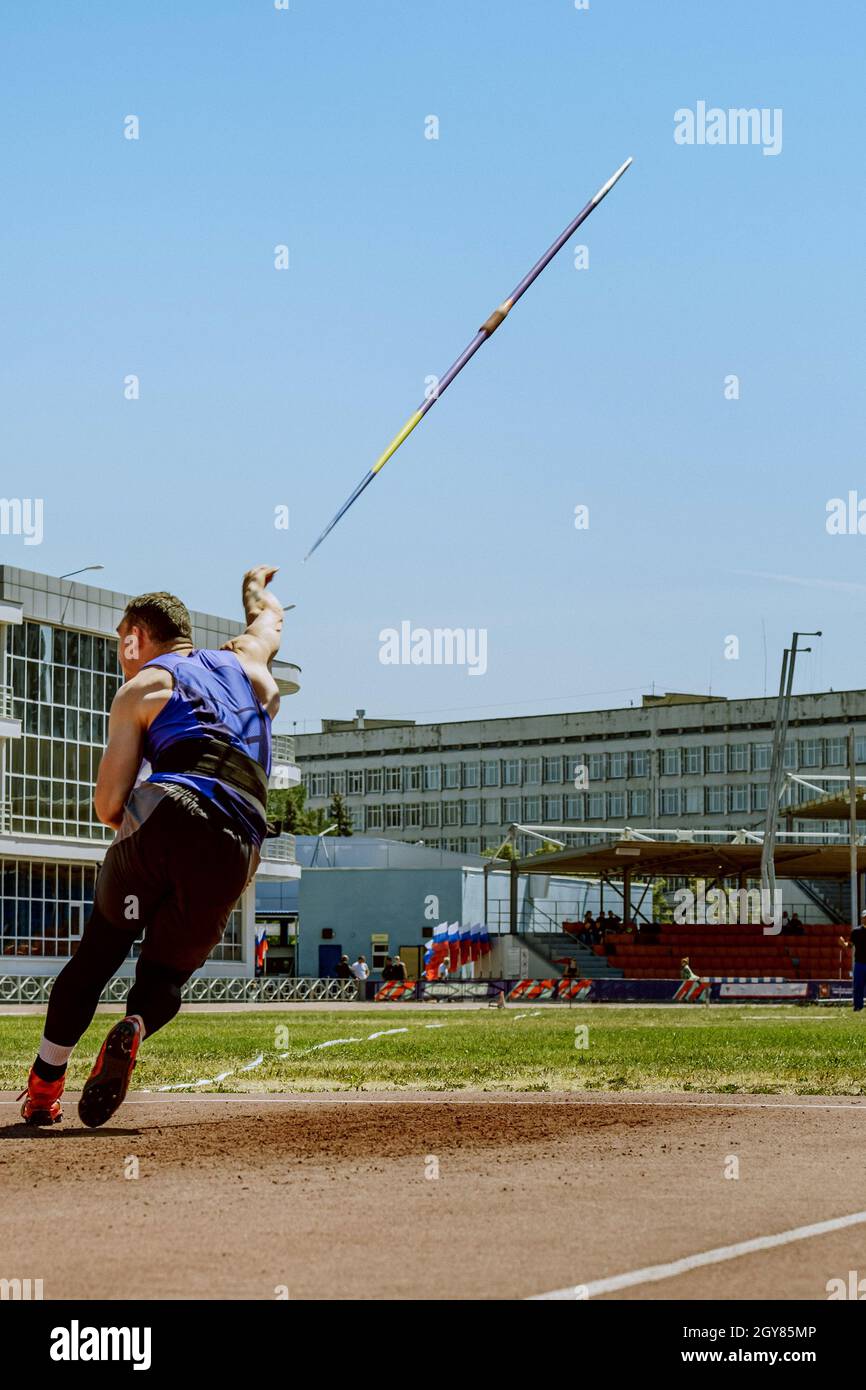 javelin throwing male athlete attempt at athletics competition Stock