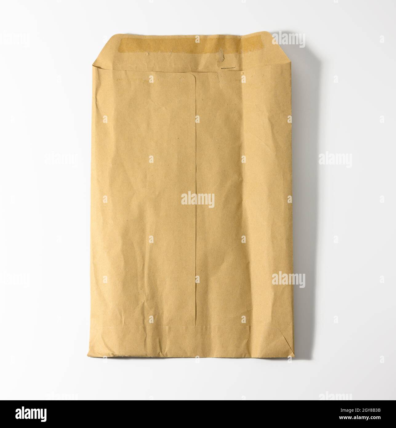 rectangular open brown kraft paper envelope on white background Stock Photo