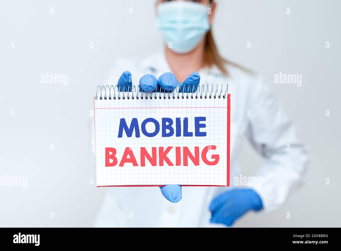 Hand writing sign Mobile Banking, Business overview to create financial transactions with the use of smartphone Demonstrating Medical Ideas Presenting Stock Photo