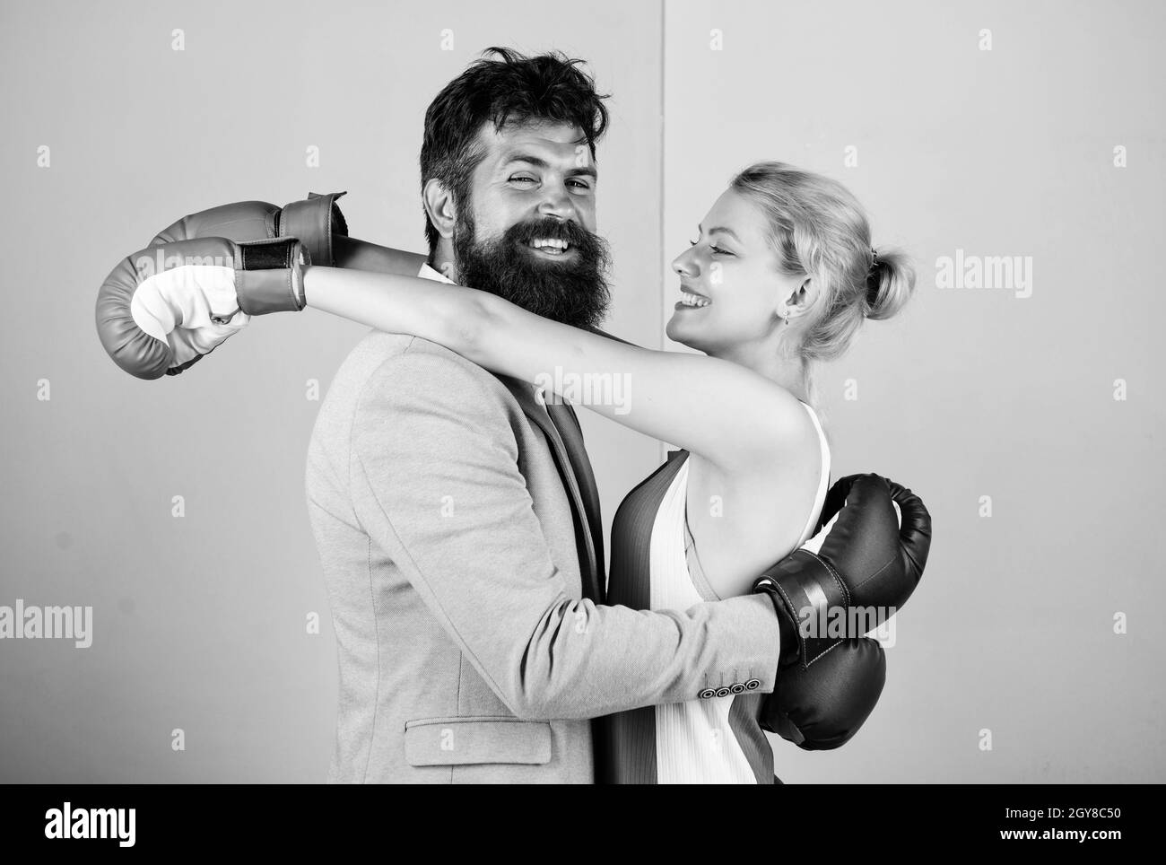 Family life. Boxers fighting gloves. Man and woman boxing fight