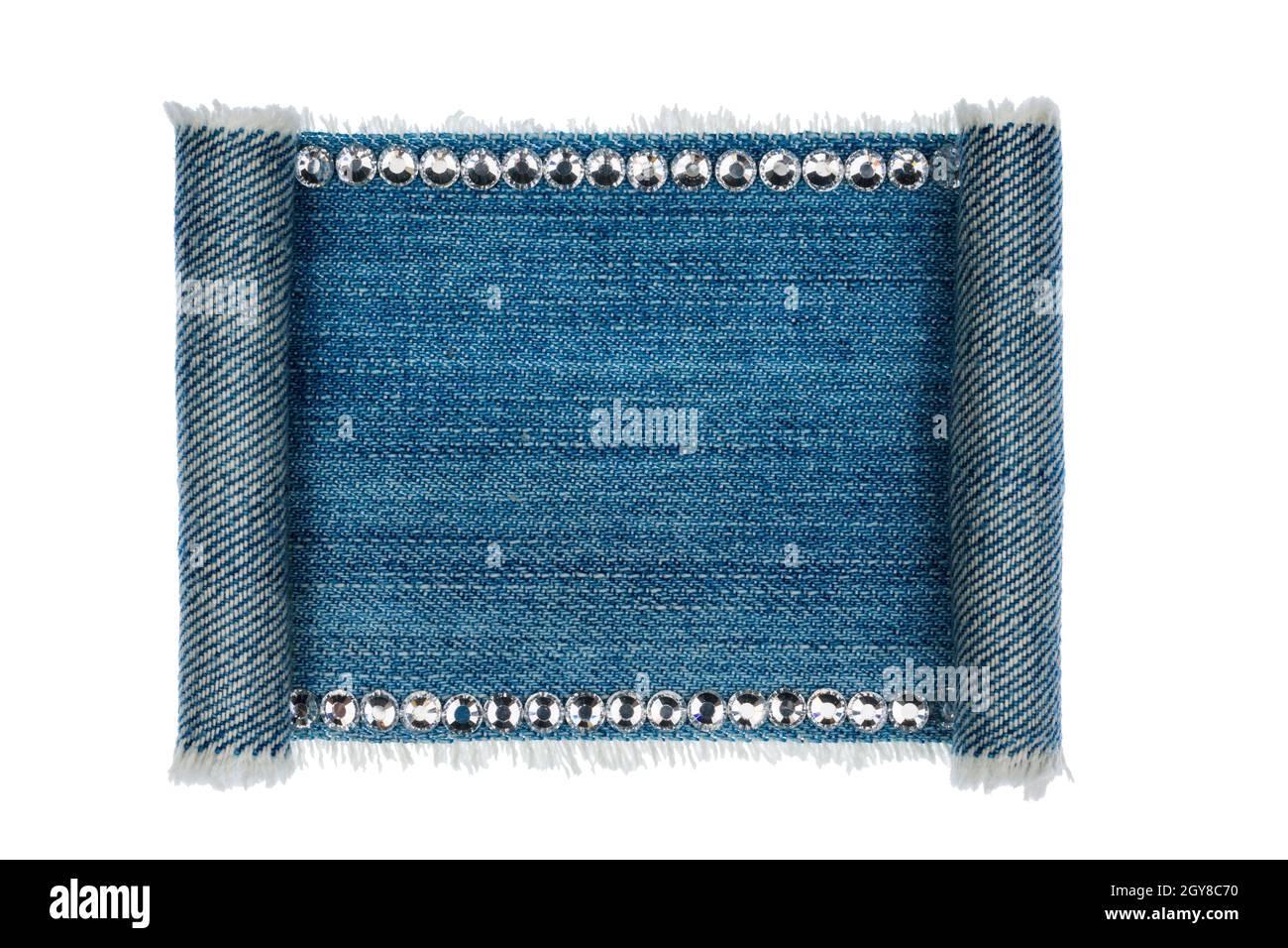Denim frame folded in the form of manuscripts,scroll isolated on white ...