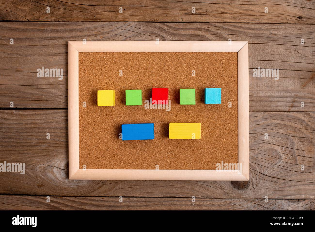 Stack of Sample Cube Rectangular Boxes On Surface Polished With Multi-Colour Stock Photo
