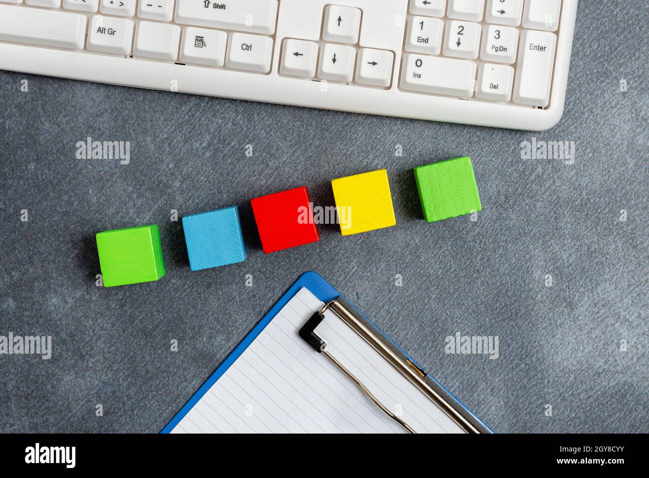 Stack of Sample Cube Rectangular Boxes On Surface Polished With Multi-Colour Stock Photo
