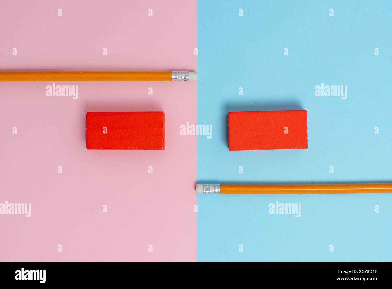 Two Objects Arranged Facing Inward Outward On a Separated Coloured ...