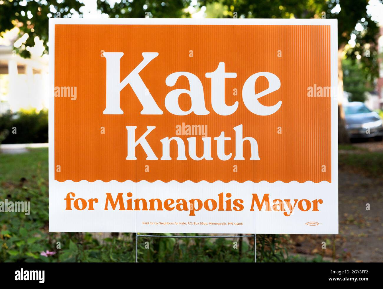 A neighborhood political yard sign with orange and white colors endorsing the election of democrat Kate Knuth for mayor of Minneapolis, Minnesota Stock Photo