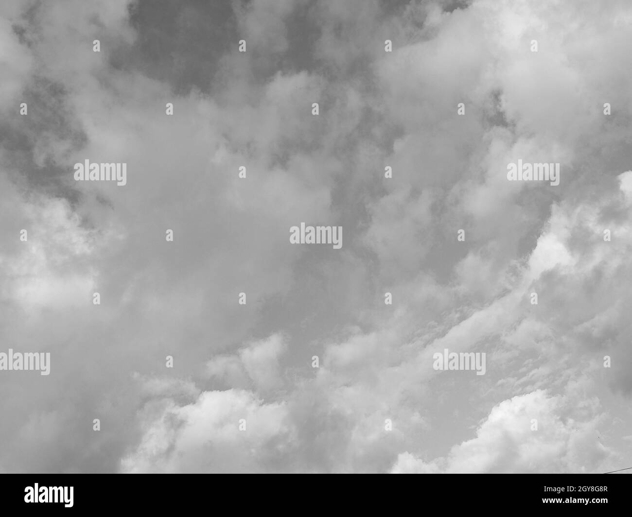 sky with clouds useful as a background in black and white Stock Photo ...