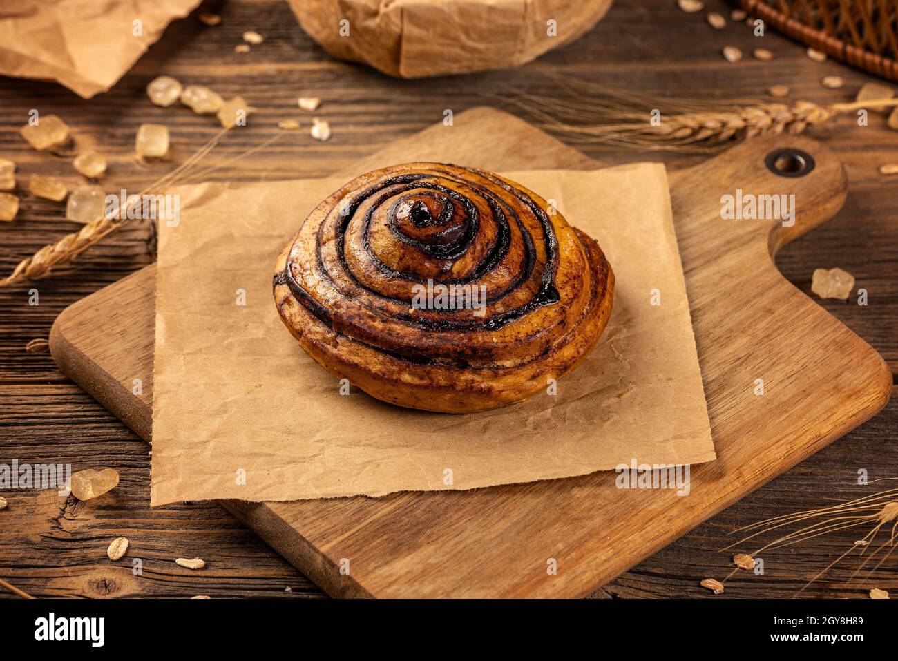 Raised dough filled with cocoa, having the form of snailhouse, bakery