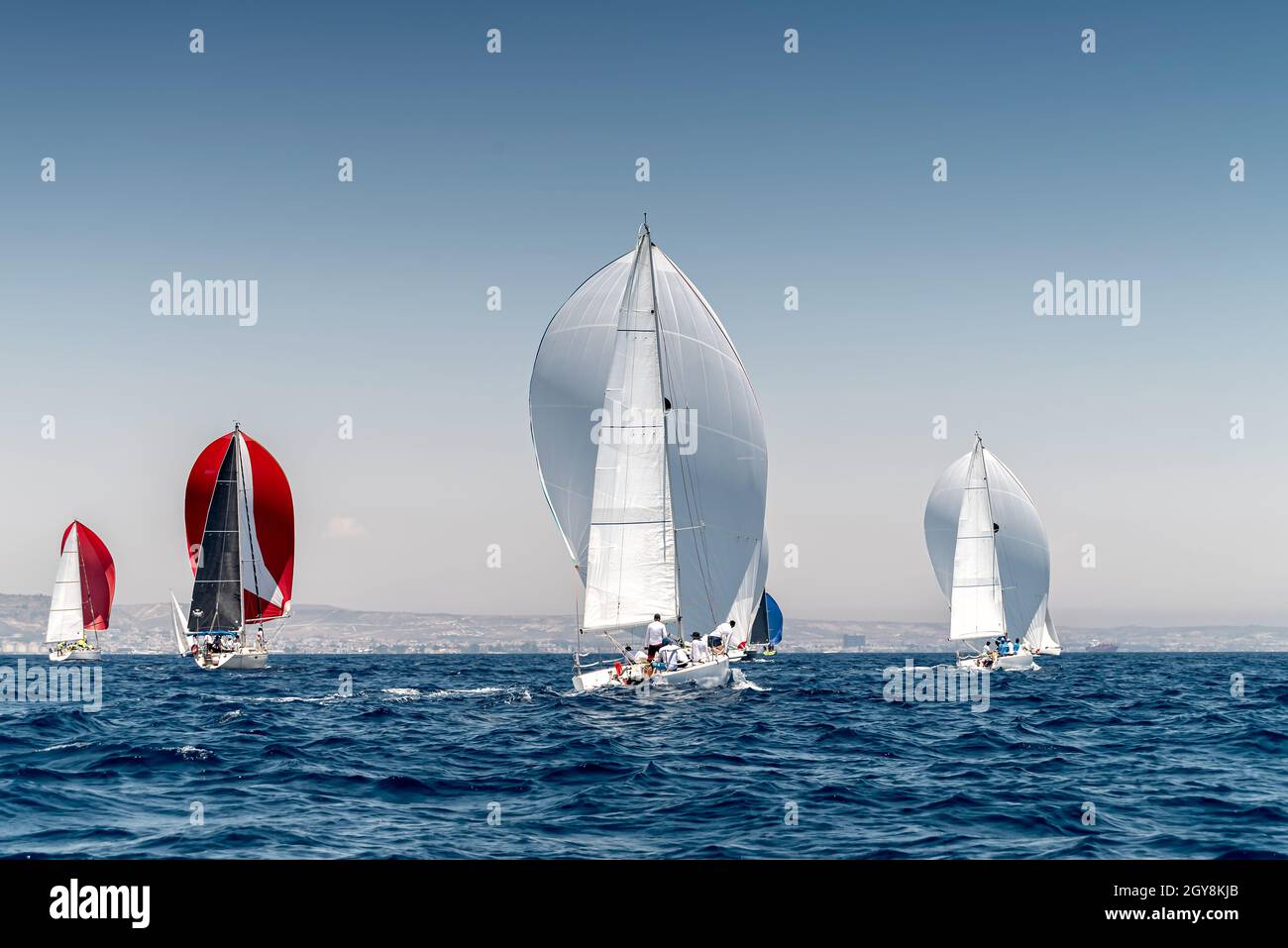 Sailboat race with multiple yachts Stock Photo Alamy
