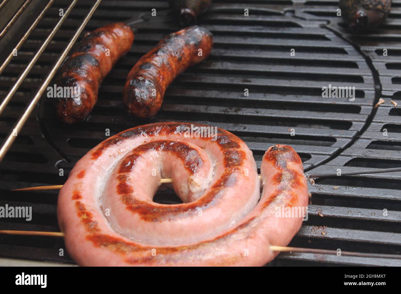 delicious barbecue sausage sausage bacon hot food flavor aroma Stock