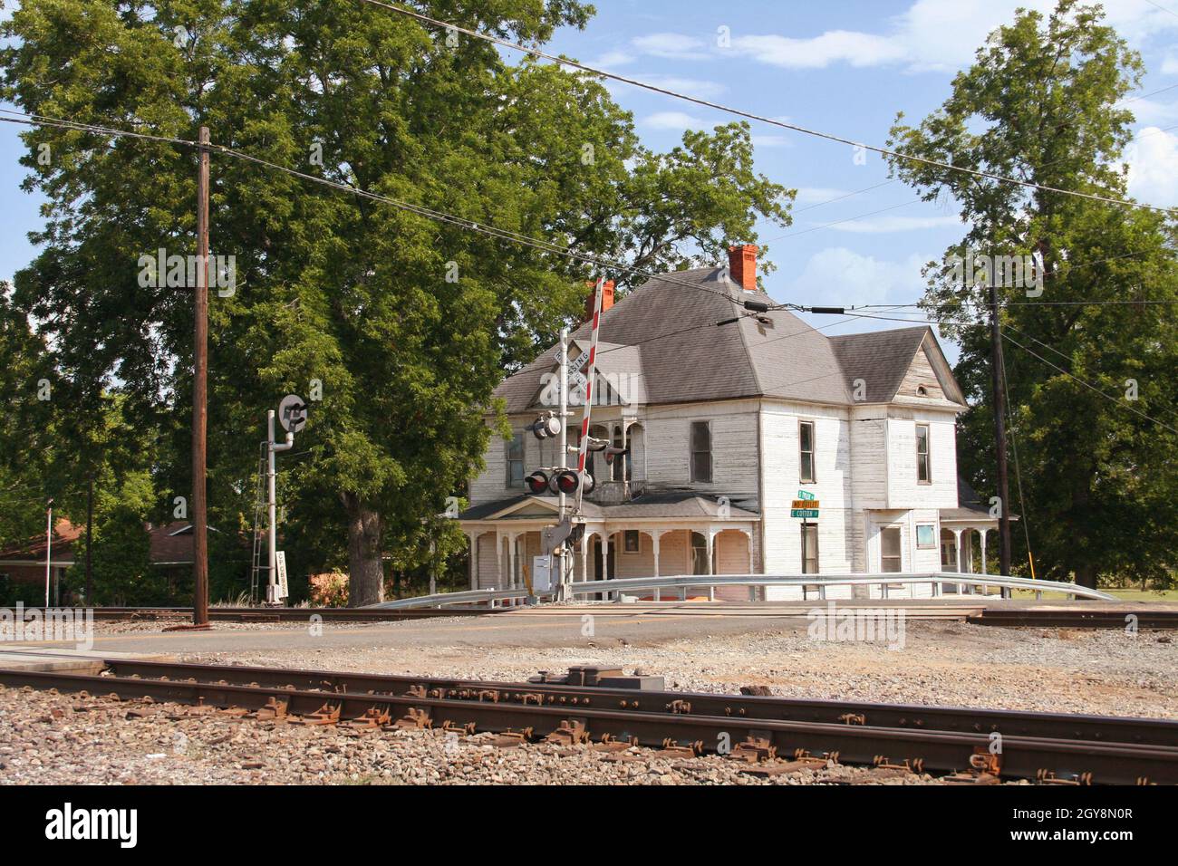 Abandoned Historic Home near railroad Stock Photo - Alamy