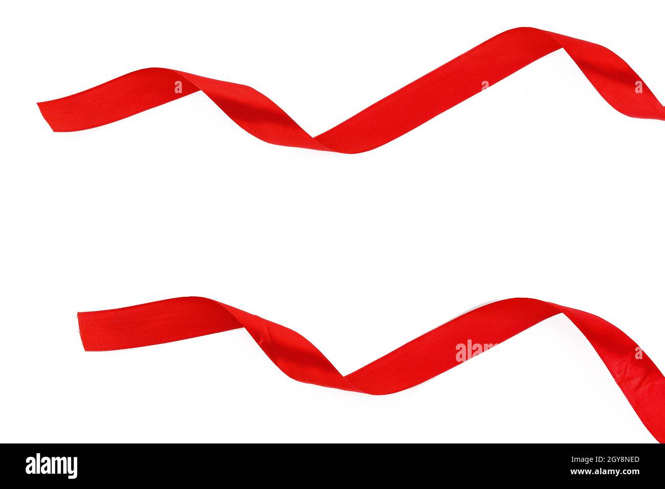 Shiny red satin ribbon isolated on white background Stock Photo - Alamy