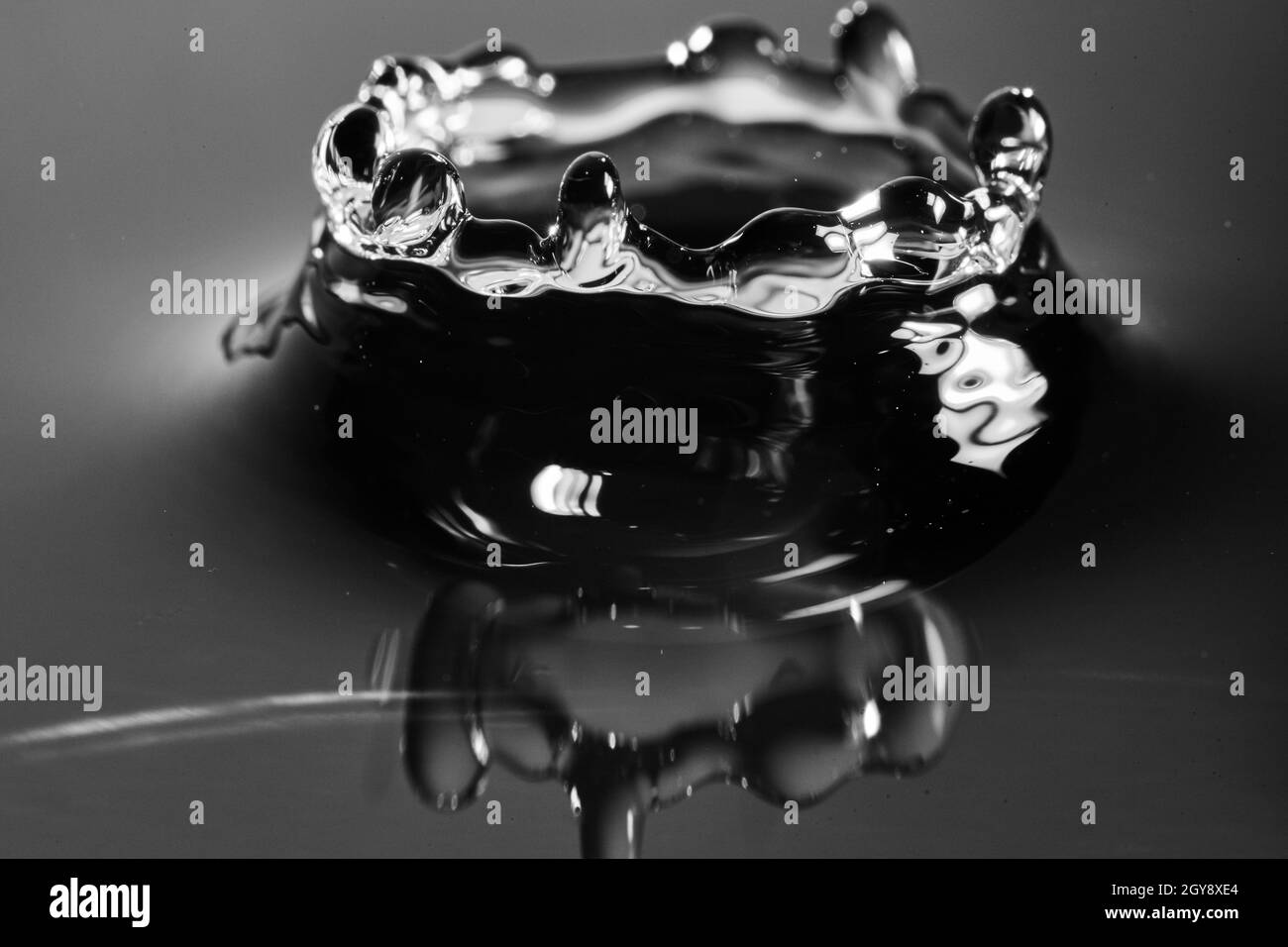 Crown of black and white created from a falling water drop Stock Photo ...