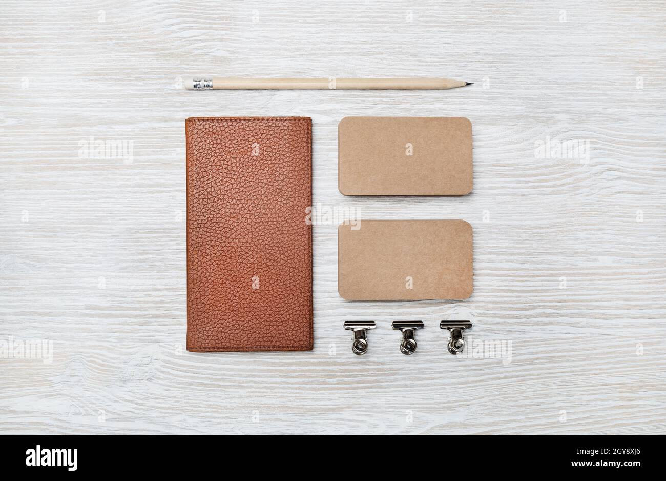 Blank family tree, notebook and pencil on wooden table, flat lay. Mockup  for design Stock Photo - Alamy