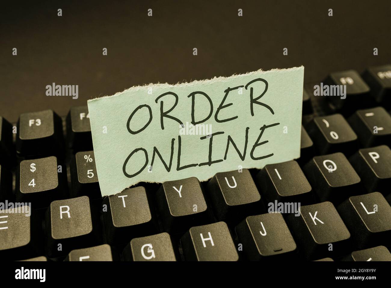 Writing displaying text Order Online, Word for Buying goods and services from the sellers over the internet Creating Online Journals, Typing New Artic Stock Photo