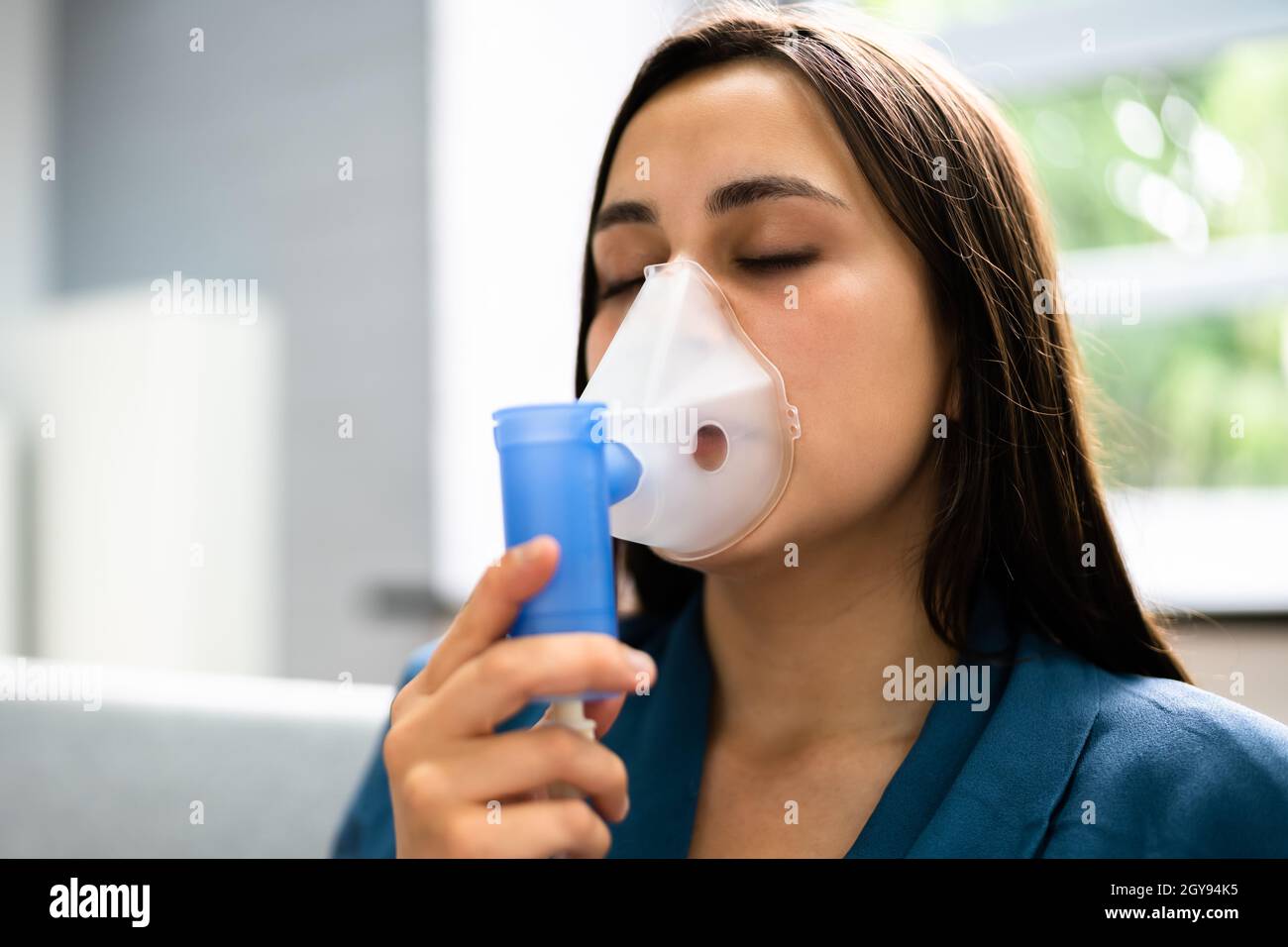 Asthma Patient Breathing Using Oxygen Mask And COPD Nebulizer Stock