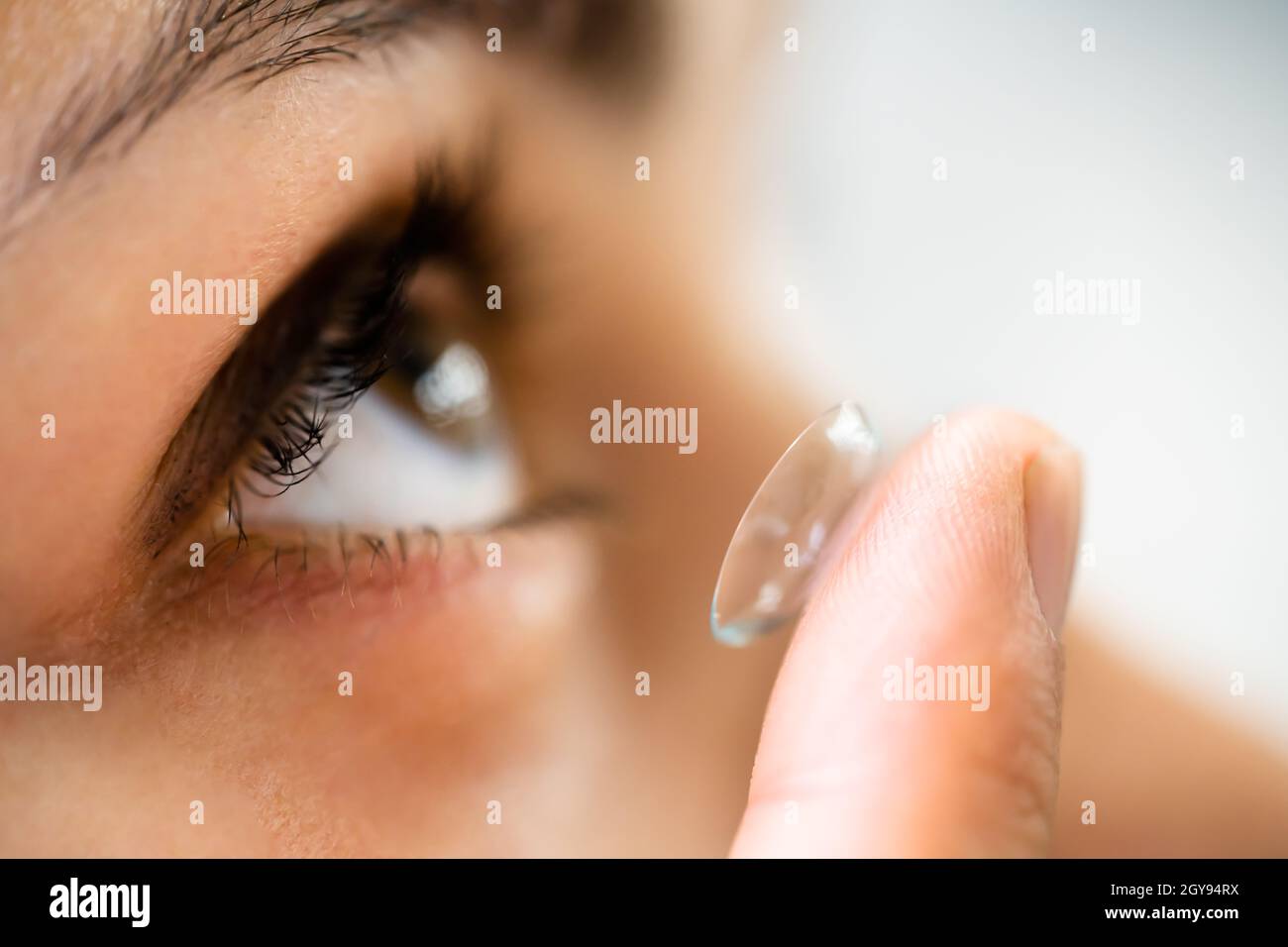 Inserting Contact Lens In Eye. Ophthalmology Eyewear Stock Photo Alamy