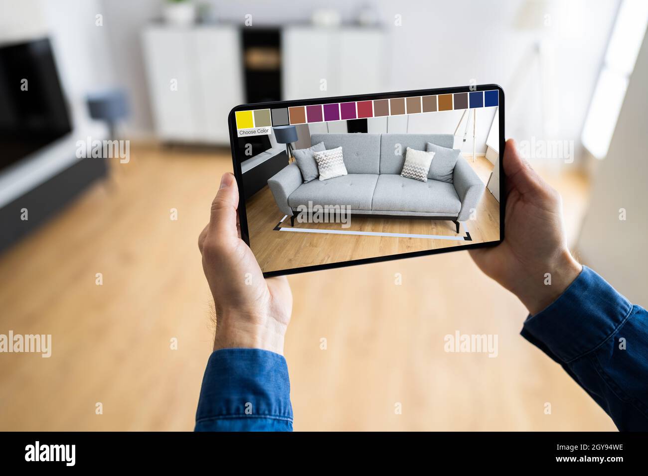 Furniture AR Smartphone Designer Application. Augmented Reality Sofa Stock Photo