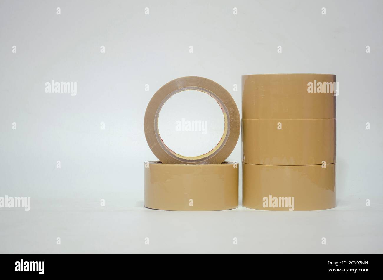 Brown tape on white background. Used for closing parcel boxes Stock