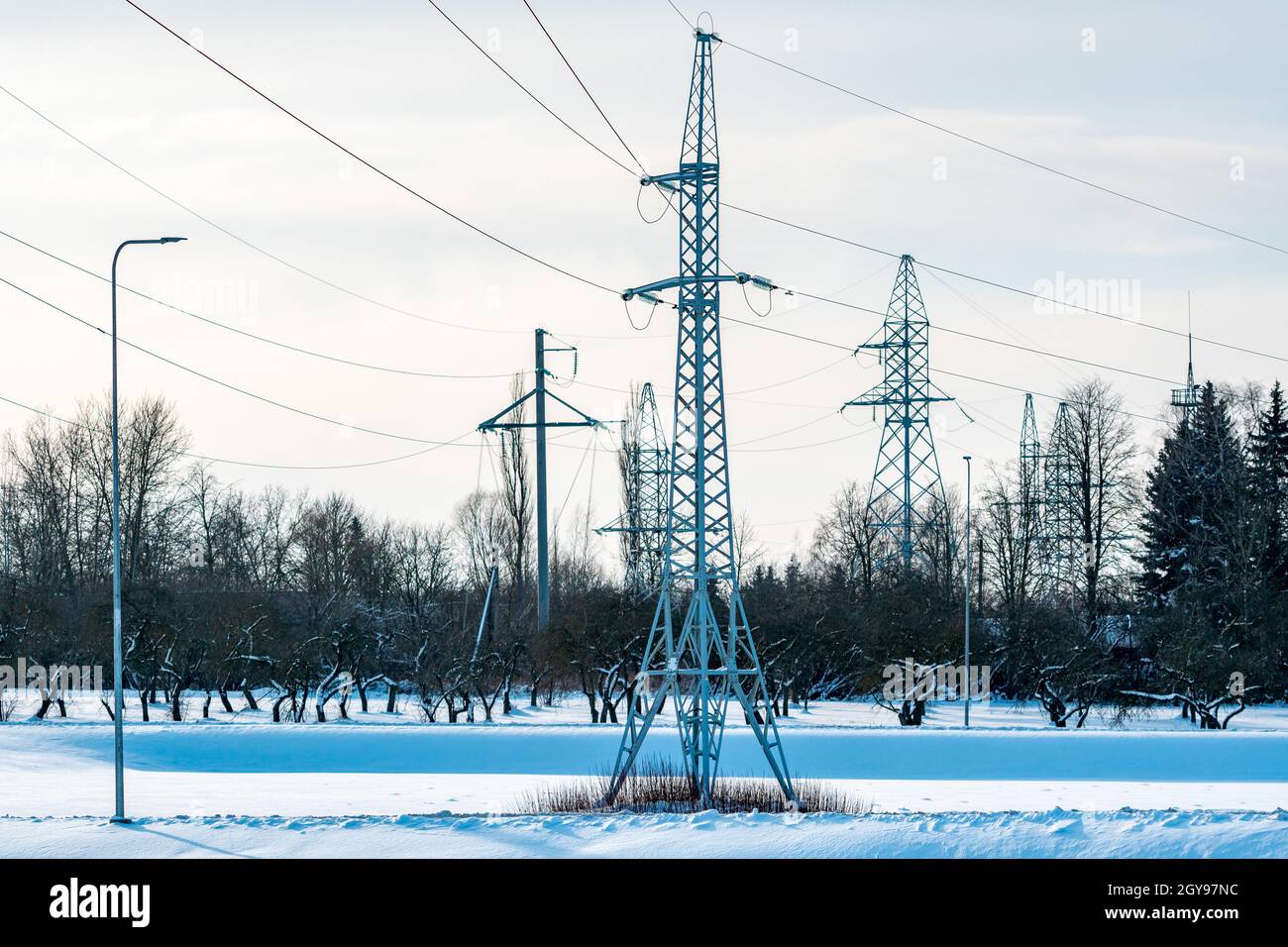 High voltage power lines in the winter. Winter landscape Stock Photo ...